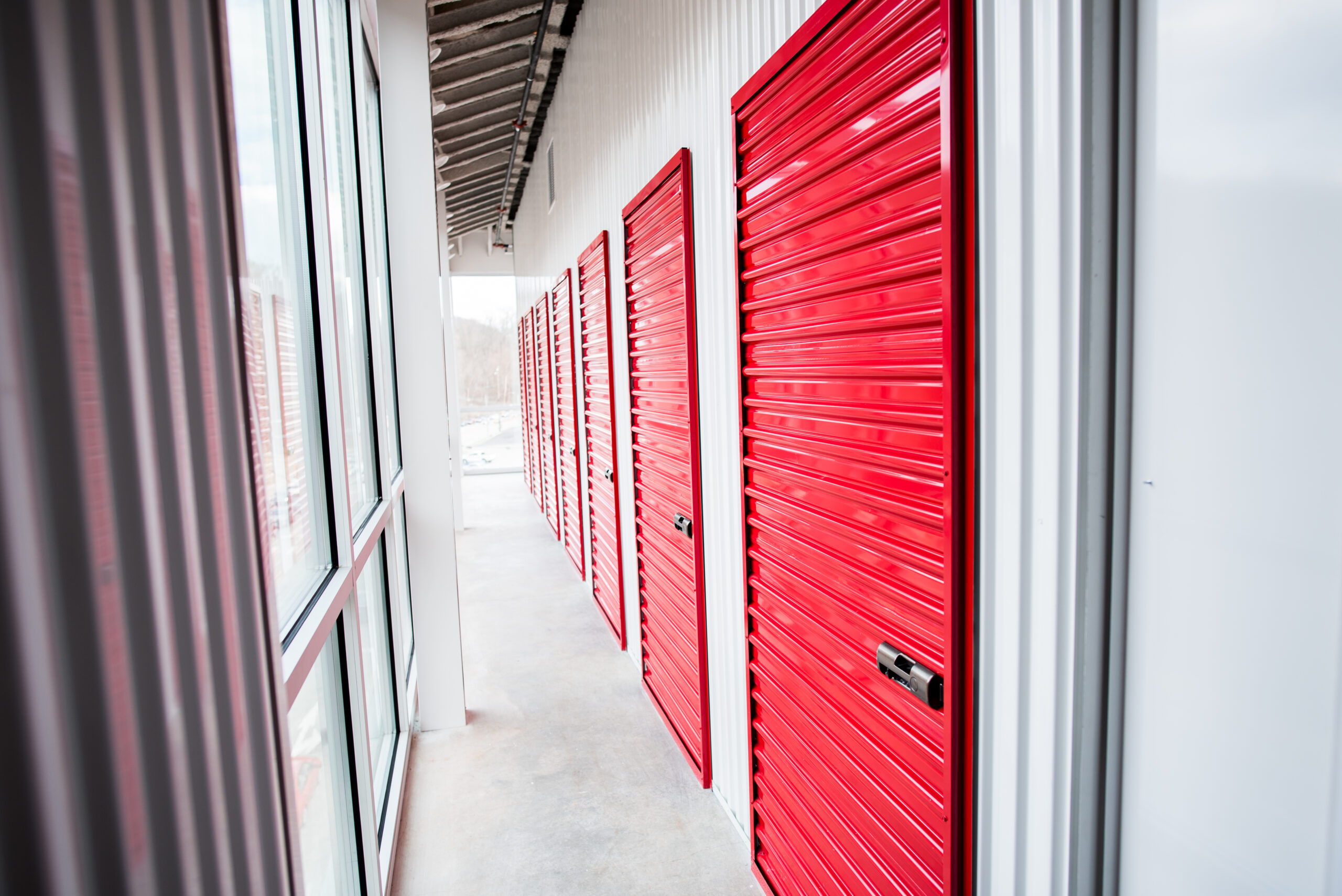 Singature red doors on the inside the newst CubeSmart Self-Storage in Pittsburgh that was construted by Franjo Construction.