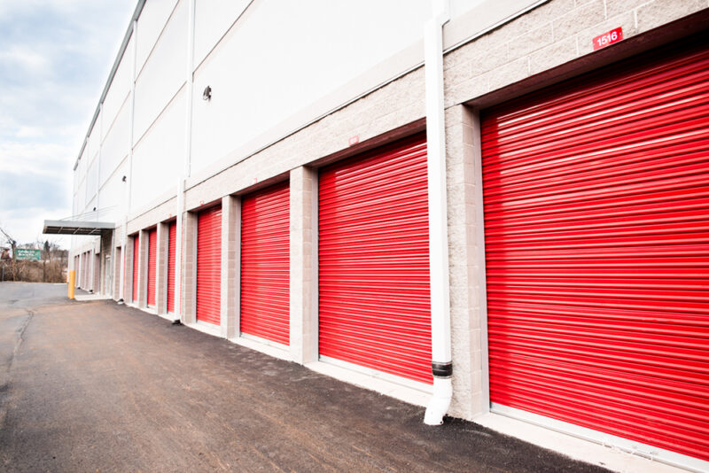 Red doors for CubeSmart's newest drive up self stroage location built by Franjo Construction.
